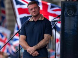 Tommy Robinson is ‘arrested under anti-terrorism laws’ after Trafalgar Square rally which saw thousands of his supporters march through London