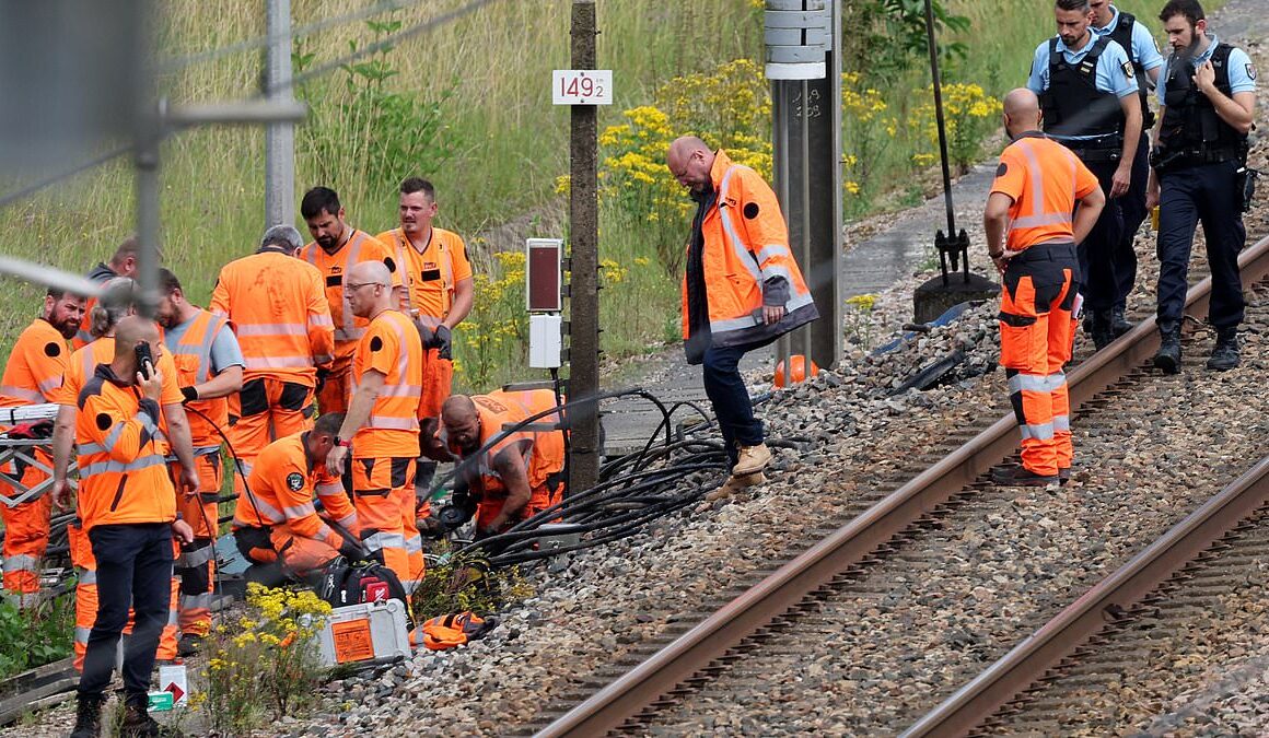 Far-left group claim responsibility for Paris arson attacks that crippled country’s rail network just hours before Olympic opening ceremony