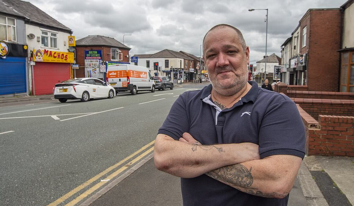 Businesses operating on ‘cursed’ Bolton road say they’re powerless to stop ‘Whacky Races’ style hooligans driving at high speeds through the junction and are demanding action after a grandmother was killed in a horror crash