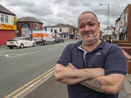 Businesses operating on ‘cursed’ Bolton road say they’re powerless to stop ‘Whacky Races’ style hooligans driving at high speeds through the junction and are demanding action after a grandmother was killed in a horror crash