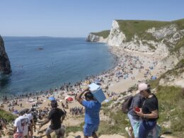 Britain’s day in the sun! Locals rush out to local beauty spots and pack out beaches to soak up 30C heat – with temperatures set to soar next week