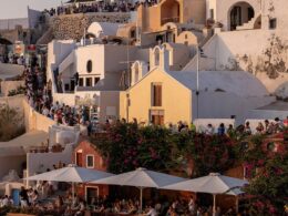 Locals’ fury as Santorini council tells them to stay ‘locked away’ at home so ‘tourists can wander free’ on their tiny Greek island – as record number of 17,000 tourists descend in ONE day