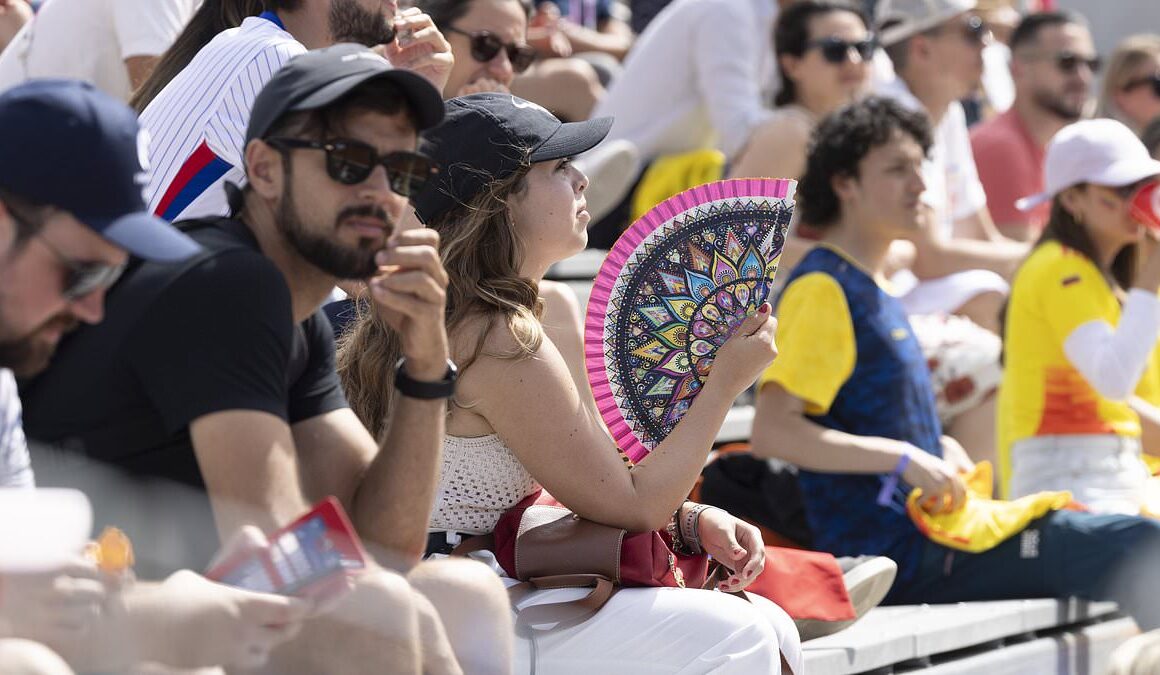 34C heat and glorious sunshine beats down on the Olympic Games after 48-hour deluge that axed events and drenched opening ceremony