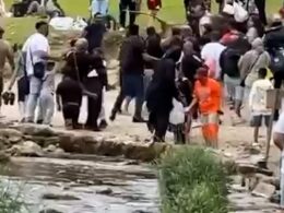 Moment huge brawl erupts at Dovedale stepping stones beauty spot as people hurl large sticks at each other