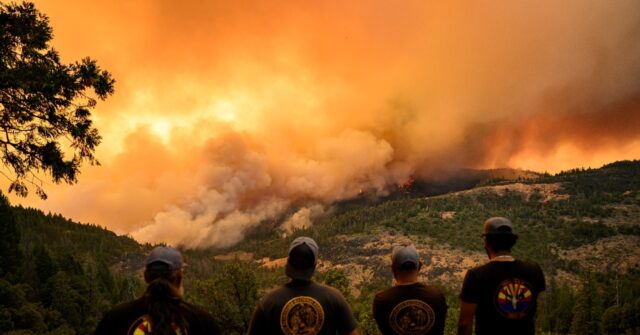 One dead in Colorado blaze as fires ravage US west