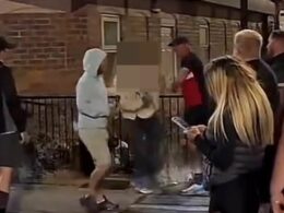 Shocking moment Asian man is punched as he walks down the street by white thug in ‘racially motivated attack’ amid violent riots in Hartlepool