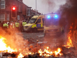 Far-right protesters clash with police near the site of U.K. stabbing attack that killed 3 girls