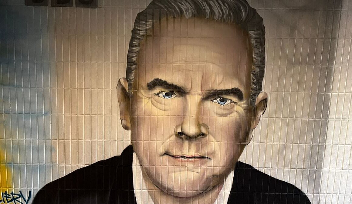 Mural of Huw Edwards is painted over in Welsh village where he grew up after he admitted making indecent images of children