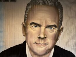 Mural of Huw Edwards is painted over in Welsh village where he grew up after he admitted making indecent images of children