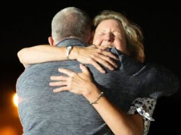 Tears, hugs and a salute as three freed Americans back on US soil after historic prisoner swap with Russia