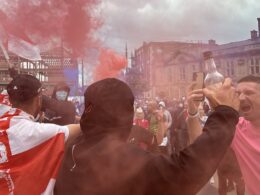 Britain braces for more riot mayhem: Masked protesters draped in England flags set off flares and attack cop cars in Sunderland, as police on horseback defend mosque from a large mob – amid fears of fresh far-right violence