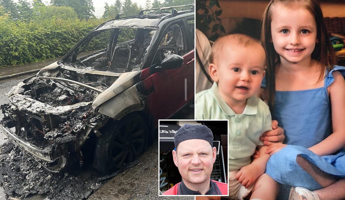 Two children saved from car fire by a quick-thinking hero who smashed the windows with his golf club