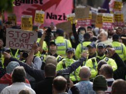 Protests in Manchester turn to trouble in just MINUTES as two men are arrested for public order offences there after separate night of riot violence in Sunderland – as tinderbox Britain braces for further trouble as a smaller crowd masses in Portsmouth