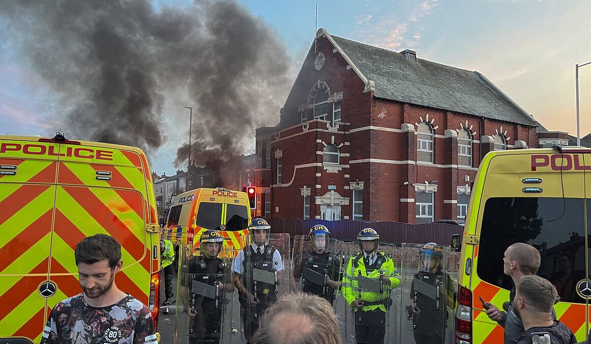 Muslims hiding in Southport mosque besieged by rioters feared they ‘would die’ as thugs torched cars, attacked police and pelted site with rocks – with those trapped inside left to consider ‘breaking their legs’ by leaping from windows to escape the mayhem