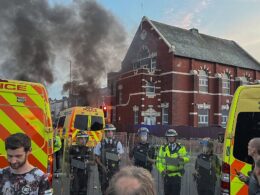 Muslims hiding in Southport mosque besieged by rioters feared they ‘would die’ as thugs torched cars, attacked police and pelted site with rocks – with those trapped inside left to consider ‘breaking their legs’ by leaping from windows to escape the mayhem