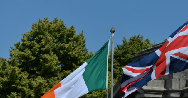 Northern Ireland Anti-Migration Rally Sees UK Union Jack and Irish Tricolour Flags Fly Side by Side