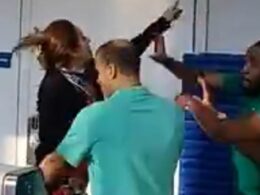 Moment raging woman hurls computer at Frontier Airlines staff ‘after missing flight from Chicago O’Hare Airport’