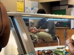 Stomach-churning moment Chicago Subway worker sits on food prep counter with his filthy BARE FEET and makes himself a sandwich