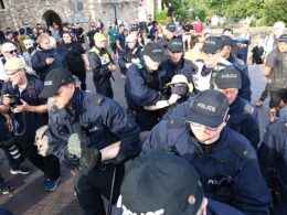 Tinderbox Britain’s week of shame: How days of riots and looting saw police cars torched, shops broken into and innocent passers-by attacked (plus THAT protester getting hit by a brick)