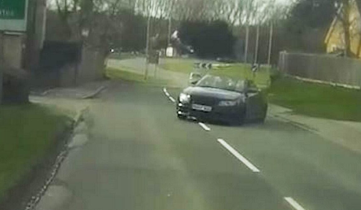 Shocking moment drink-driver with children on board loses control of his Audi RS4 and smashes head-on into another car