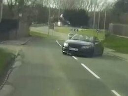 Shocking moment drink-driver with children on board loses control of his Audi RS4 and smashes head-on into another car