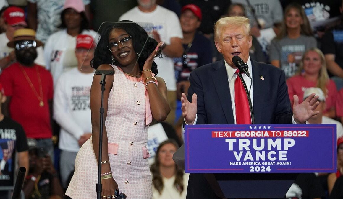 Trump’s risqué remark to young activist who went viral for hugging him at Chick-fil-A after he invited her on stage at rally – as she makes VERY personal dig at Kamala