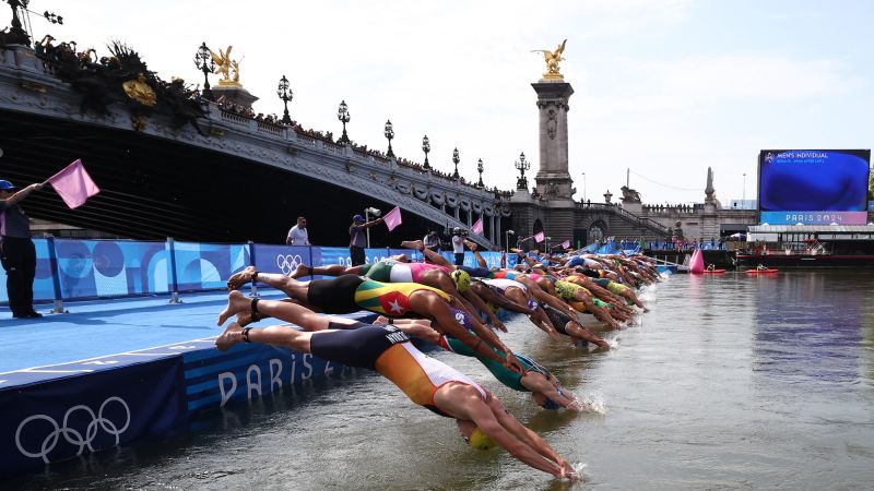 Belgium withdraws from mixed relay triathlon after triathlete falls ill days after swimming in the Seine