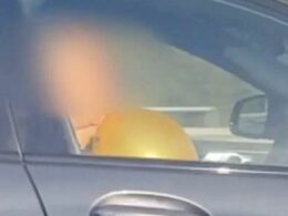 Shocking moment BMW driver ‘inhales hippy crack balloon’ while on the motorway as police release montage of motorists being caught red-handed