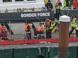 Dozens of migrants arrive in Dover escorted by Border Force officials after crossing the English Channel – as more than 3,000 asylum seekers arrive in the month since Labour came to power