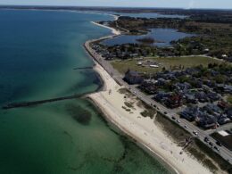 Wealthy homeowners on idyllic island beloved by the Obamas could lose stunning private beach as ugly civil war takes new twist