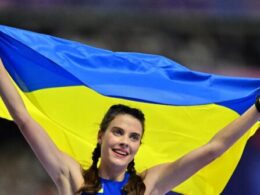 Emotional Mahuchikh dedicates Olympic gold to slain Ukrainian athletes