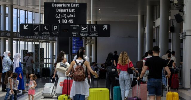 Travellers rush to leave Lebanon amid spiking tensions, cancelled flights