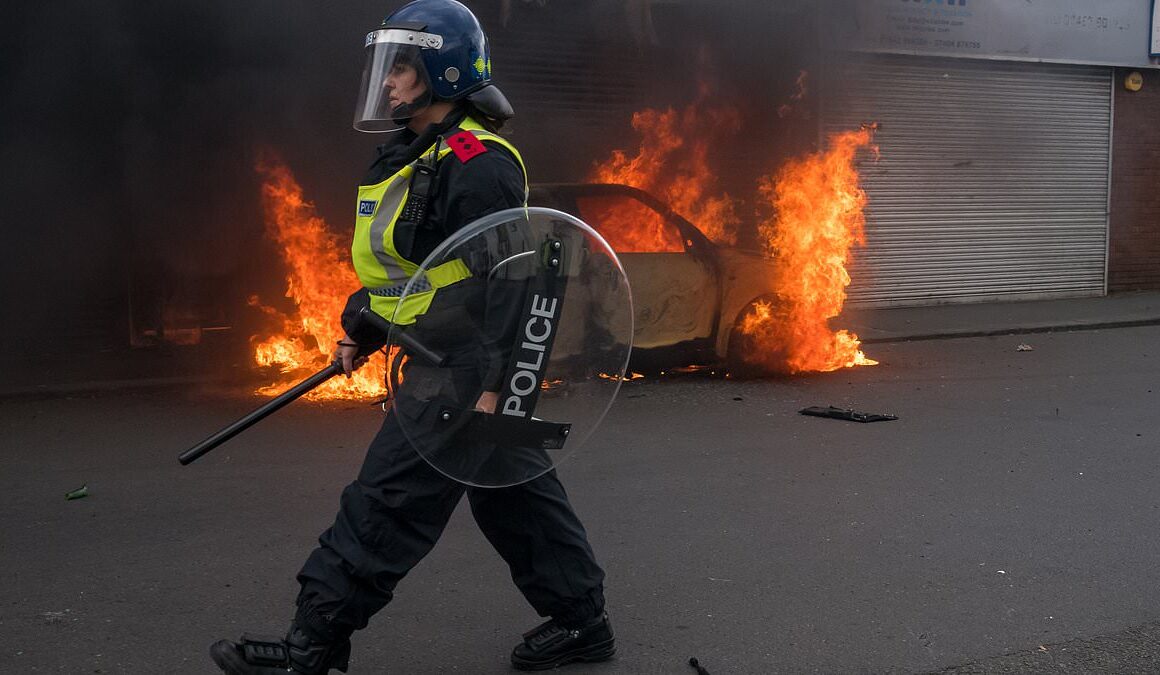 Police charge more than a dozen people after violent riots with scores arrested following overnight clashes that saw migrant hotels mobbed and police attacked as CPS vows to take ‘immediate’ action against lawbreakers