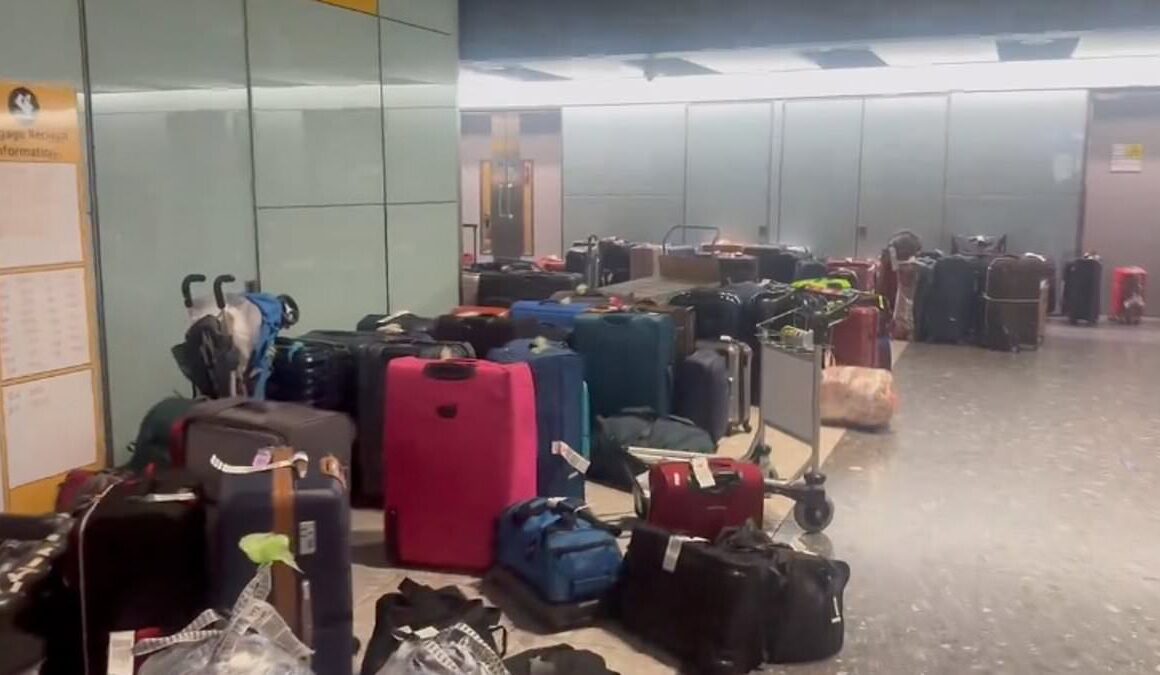 Airline bosses battle to clear baggage chaos at Heathrow after mountains of luggage are left to pile up after 60 British Airways flights are cancelled due to torrential rain and thunder in Europe