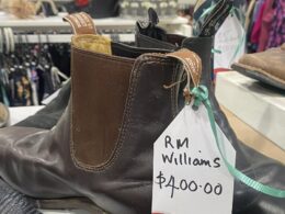 Single photo of boots for sale at opshop sparks major debate: ‘That’s disgusting’