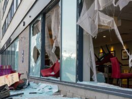 Asylum seekers in Rotherham hotel which far right rioters attacked and tried to burn down reveal their terror as footage inside Tamworth Holiday Inn shows damage there from yobs