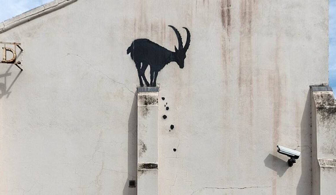 Banksy unveils latest mysterious piece: Silhouette of a goat appears on a wall near the River Thames in London as legendary street artist confirms the work is his