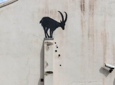 Banksy unveils latest mysterious piece: Silhouette of a goat appears on a wall near the River Thames in London as legendary street artist confirms the work is his