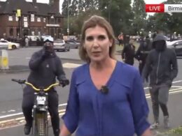 Moment Sky News reporter is harassed by aggressive dirt bike riding protester in Birmingham who yells ‘Free Palestine’ before making obscene gestures to the camera