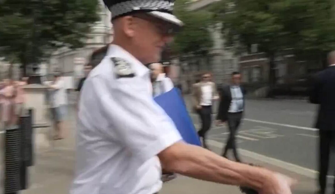 Scotland Yard defends Met Police boss Mark Rowley for being ‘in a hurry’ after he bizarrely grabs reporter’s microphone when quizzed about ‘two-tier policing’- while Keir Starmer vows ‘standing army’ of specialist officers will crack down on rioters