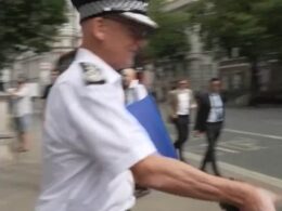 Scotland Yard defends Met Police boss Mark Rowley for being ‘in a hurry’ after he bizarrely grabs reporter’s microphone when quizzed about ‘two-tier policing’- while Keir Starmer vows ‘standing army’ of specialist officers will crack down on rioters