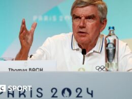 Bach to step down as Olympic chief next year