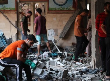 At least 100 killed by Israeli strike on a school where thousands were sheltering, officials say