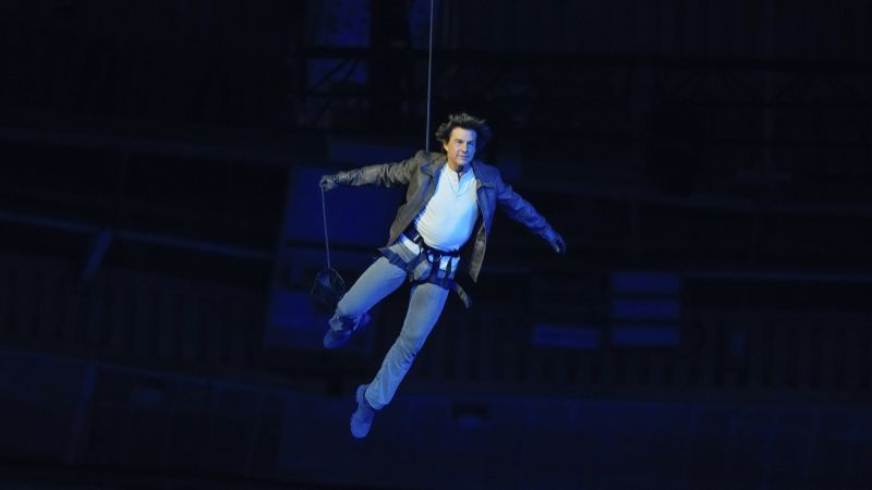 Tom Cruise performs crazy stunt jump from stadium roof during Olympics closing ceremony