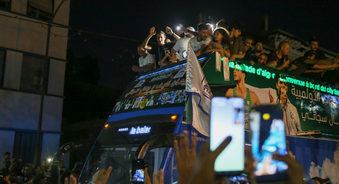 Embattled Algerian Olympic boxer returns home to a hero’s welcome