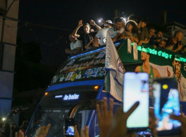 Embattled Algerian Olympic boxer returns home to a hero’s welcome