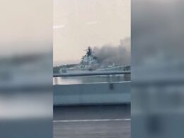 Old aircraft carrier, once part of mighty Soviet fleet, burns in Chinese lagoon